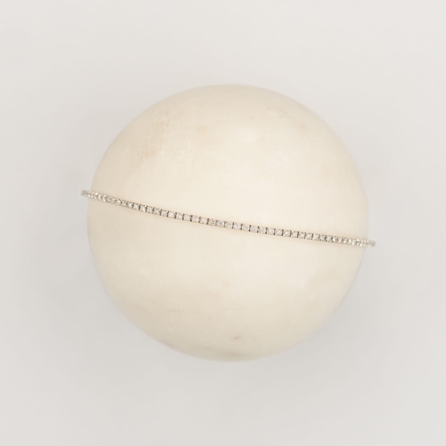 gold tennis bracelet with diamonds
